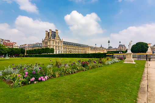 Paris, France - May 2019: Louvre palace and Tuileries garden in spring