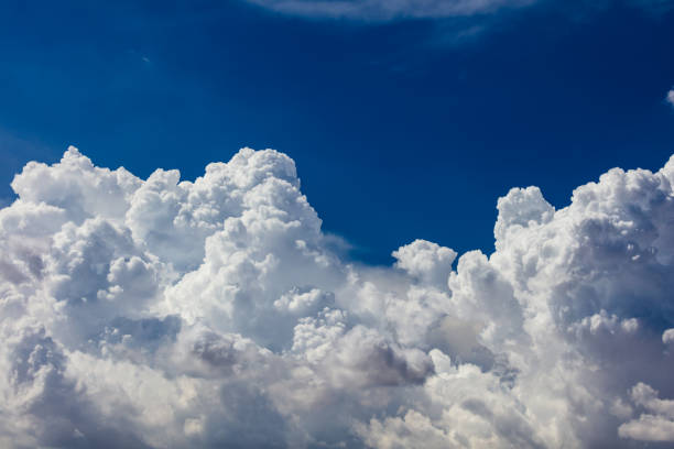 istock Closeup, cumulus clouds. Blue sky in background. 1928083445