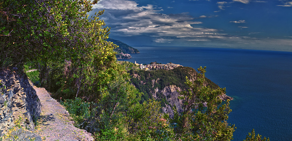 Cinque Terre views of hiking trail along seaside villages on the Italian Riviera coastline. Liguria, Italy, Europe. 2023 Summer.
