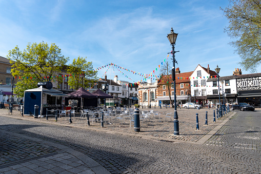 Street view of Highgate High street. Fragment of facade of local small shops. North of London