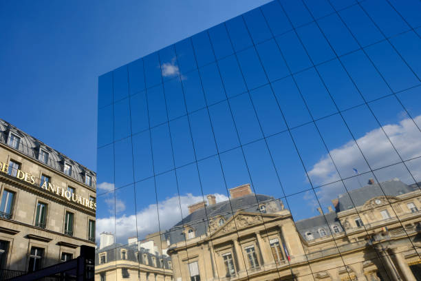 BORDEAUX, FRANCE - 17 May, 2015 : Bordeaux water mirror full of people in one of the hotest summer day, having fun in the water, the pool is the largest water mirror in the world with 3450 sq.m.