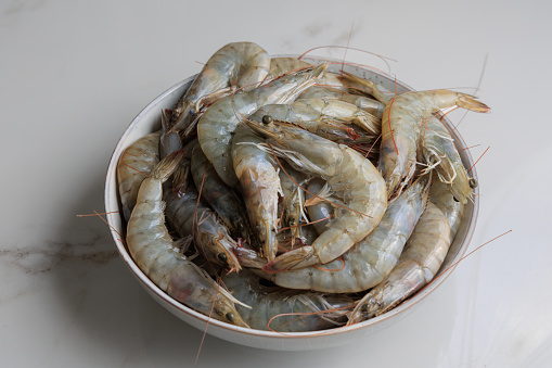 Raw shrimps in a plate