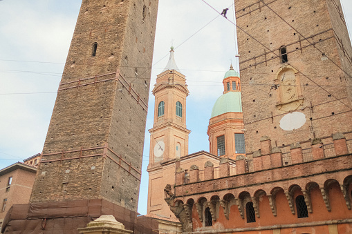 View up to ancient towers and basilica