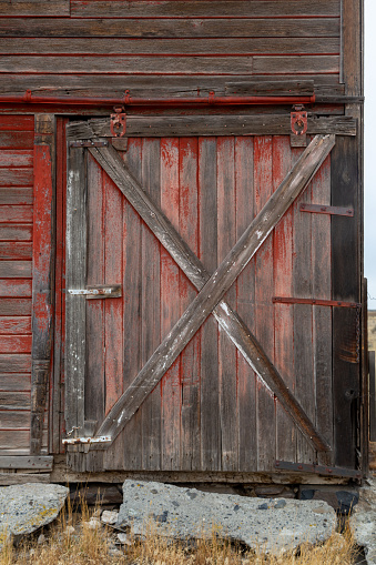 A weathered old sliding barn door