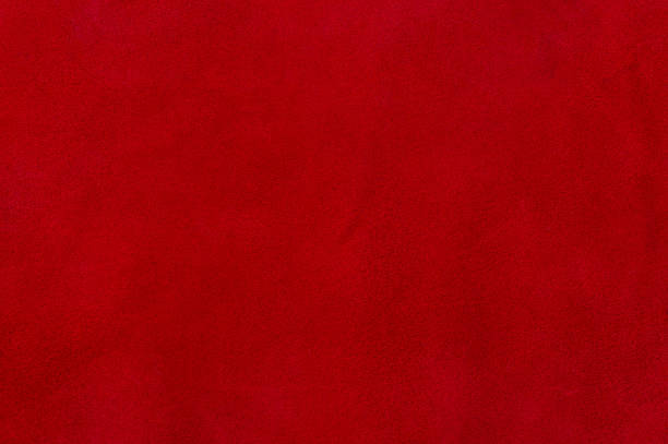 istock Red suede texture. Natural red dyed leather, suede macro photo. 1928432294
