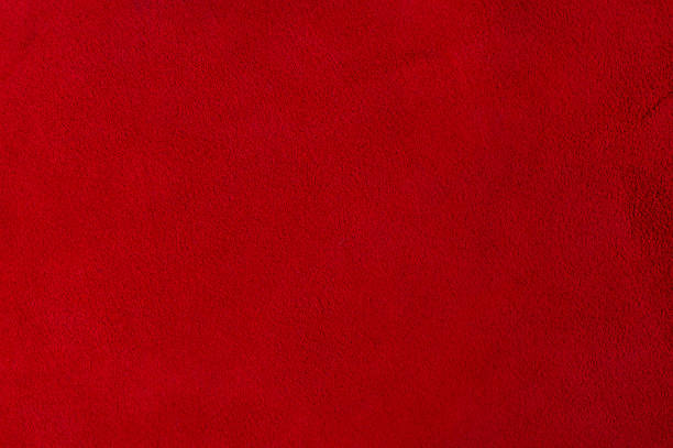 istock Red suede texture. Natural red dyed leather, suede macro photo. 1928432298