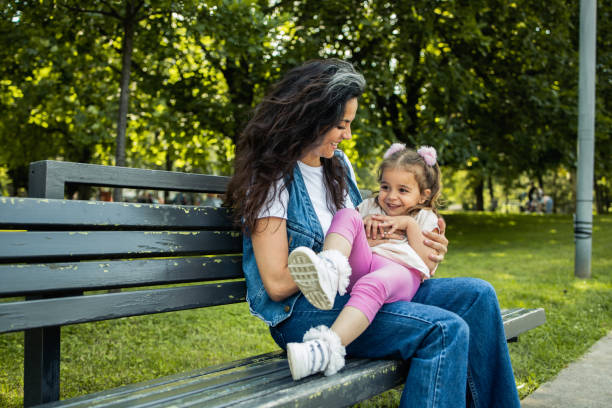 istock Happy little girl is playing outside 1928456838