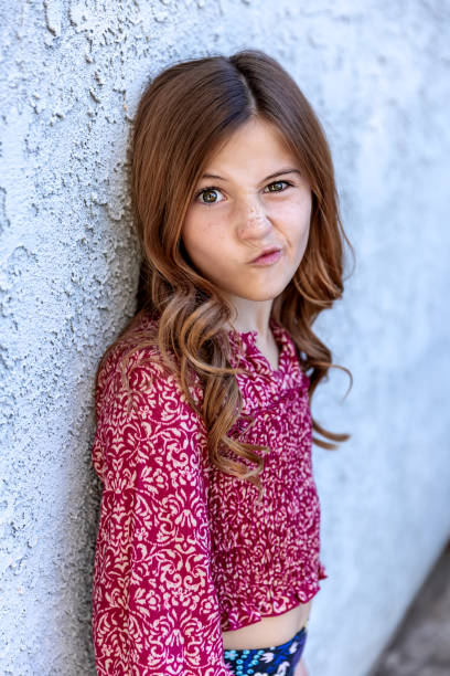 istock Close up portrait young girl sassy expression 1928631290