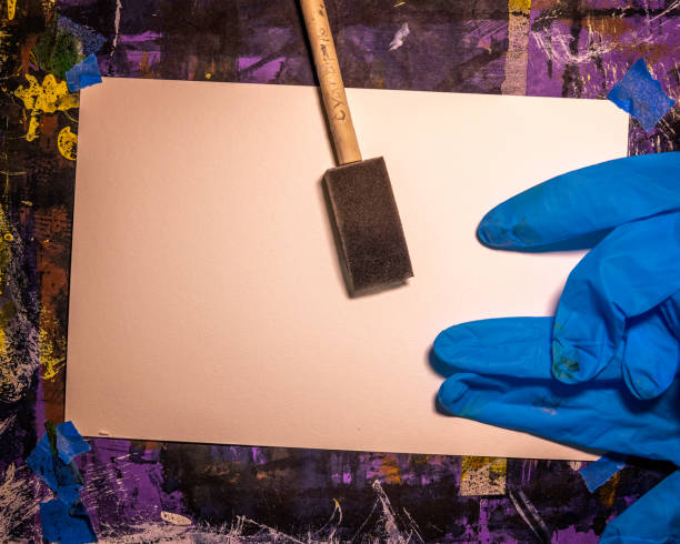 Brushing Cyanotype Chemicals on Paper.