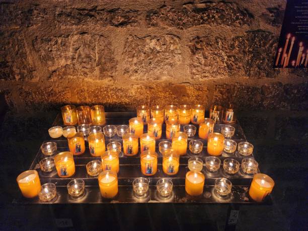 Prayer candles in ancient French monastery