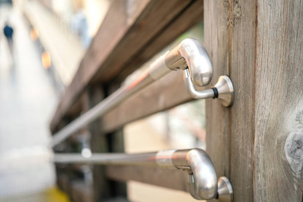 Close-up at overpass walkway banister handrail, using to holding during walking down for safety. Transportation equipment object, selective focus.