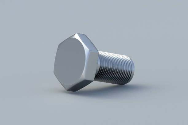 istock One metal bolt on gray background. Construction materials. Industrial equipment. Tools in the workshop. 3d render 1928877778