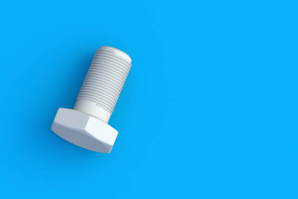 Plastic bolt on blue background. Construction materials. Industrial equipment. Tools in the workshop. Top view. Copy space. 3d render