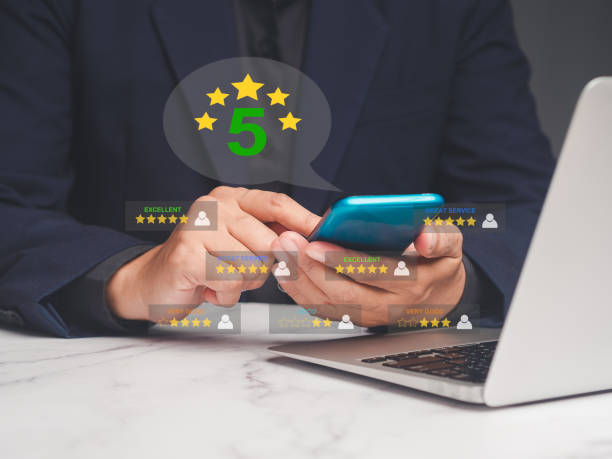 istock Satisfaction and feedback surveys. A businessman using a smartphone gives the five-star icon a rating of very impressed for service 1928904676