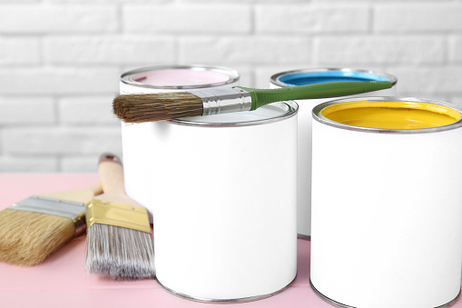 Colorful paint cans with brush.Similar photographs from my portfolio: