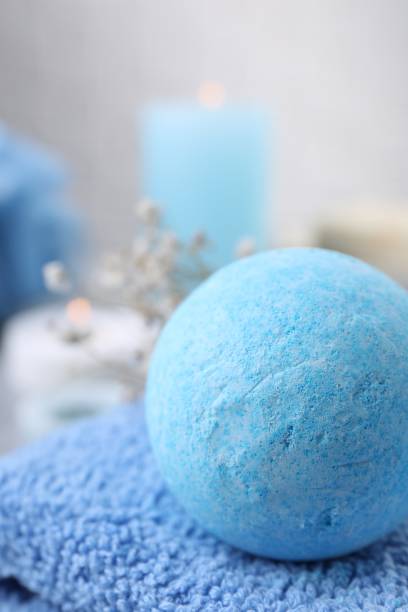 istock Beautiful aromatic bath bomb on towel, closeup. Space for text 1928988698