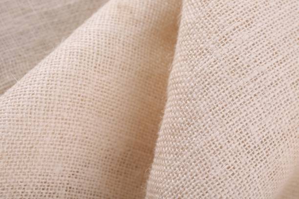 istock Texture of beige burlap fabric, closeup view 1929001128