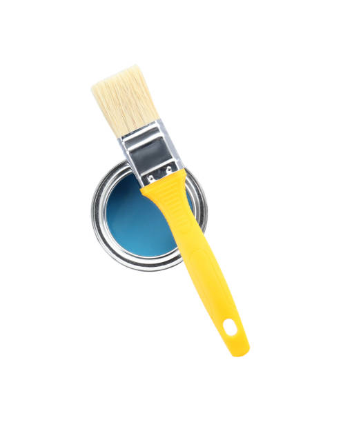 istock Can of light blue paint with brush isolated on white, top view 1929002207