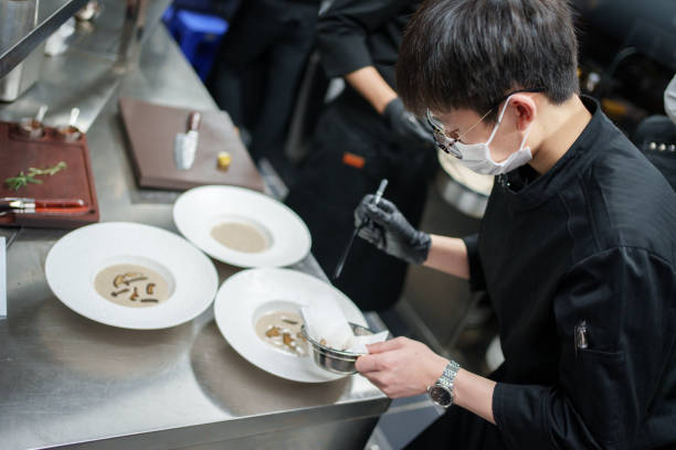 istock Chef preparing cream of mushroom soup 1929002271
