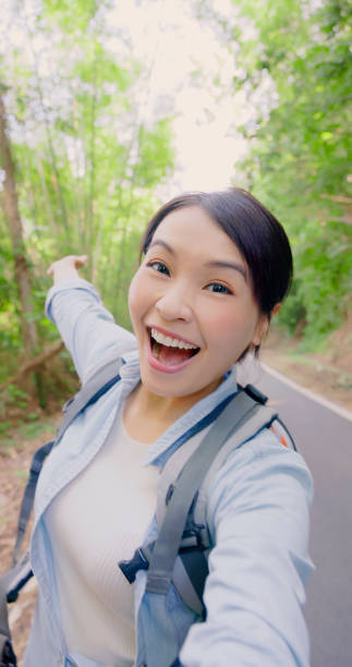 istock Asian woman hiking in mountain 1929128930