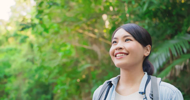 istock Asian woman hiking in mountain 1929129471
