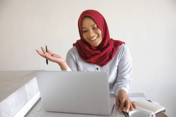 istock Financial advisor have video conference with her clients online 1929144881