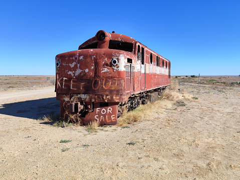 Old Ghan rusty locomotive abandoned in Marree, a small town in the desert environment of North-eastern part of South Australia.