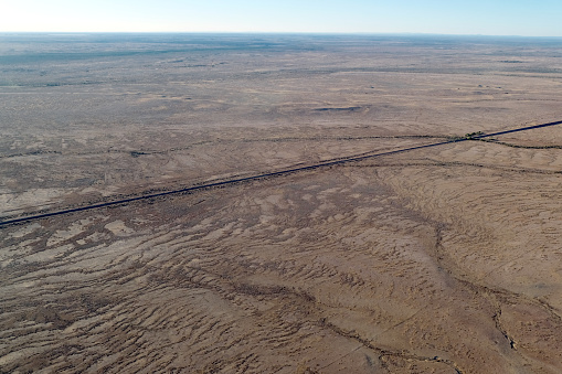Aerial view of the dry desert at the edge of Lake Eyre, South Australia state.