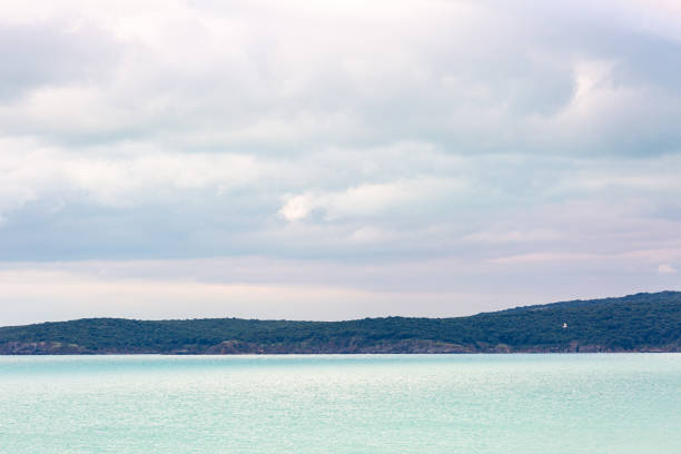 Landscape with sea and cloudy sky
