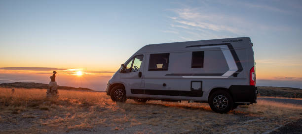 istock Sunset in the mountains with a van in the foreground 1929318087