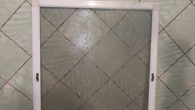 Washing mosquito nets for metal-plastic windows