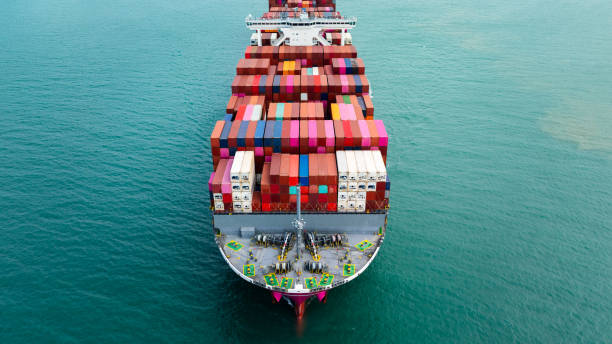 istock logistic cargo container ship sailing in sea to import export goods and distributing products to dealer and consumers across worldwide, aerial front view 1929400688