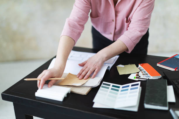istock Interior designer working with color palettes, textiles and materials 1929415435