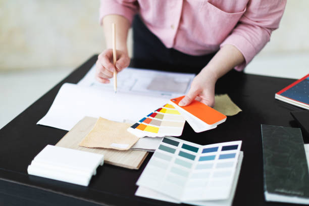 istock Interior designer working with color palettes, textiles and materials 1929416990
