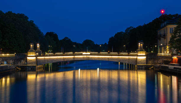 istock Illuminated bridge over the river Lidan in Lidkoping, Sweden 1929417527