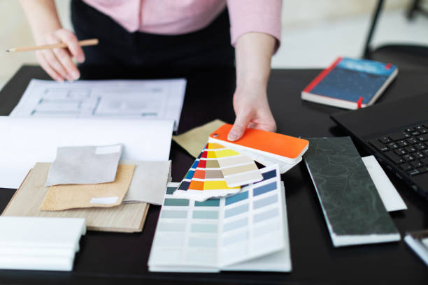 istock Interior designer working with color palettes, textiles and materials 1929418062