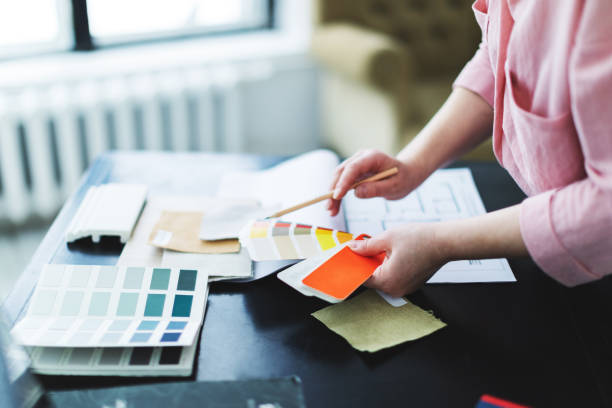 istock Interior designer working with color palettes, textiles and materials 1929418063