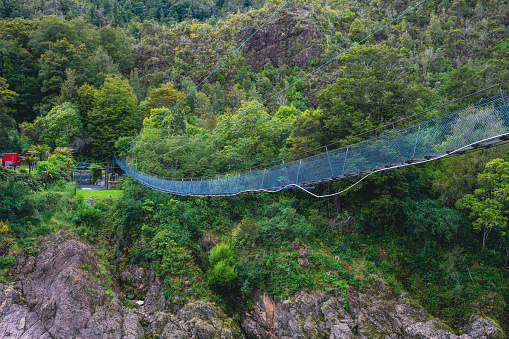 Witness the exhilarating Buller Gorge Swingbridge in New Zealand, an iconic adventure spot surrounded by breathtaking natural scenery. Unforgettable adrenaline awaits.