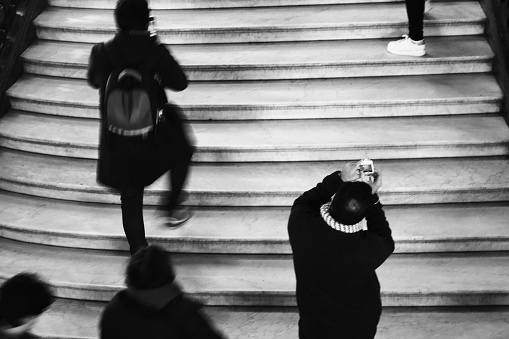 Opera Garnier tourists taking photos going upstairs