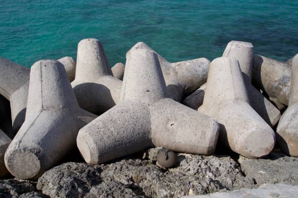 istock Lots of concrete tetrapods piled up along the seafront. 1929530210