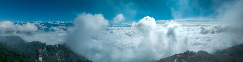 Aerial view of Himalayan mountain range seen from Nagarkot surrounded by clouds. The highest mountains in the world seen from Nepal.