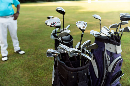 Golf clubs in golf bags