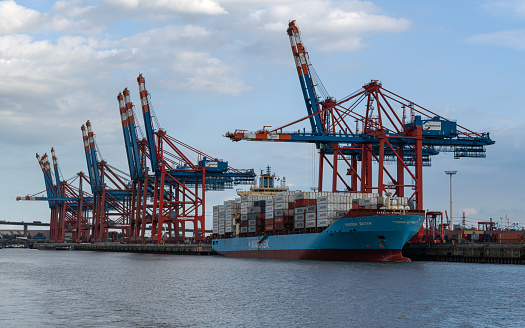 Hamburg, Germany - August 23, 2023: Container ship MAERSK Batam in the port of Hamburg on August 23, 2023 in Germany