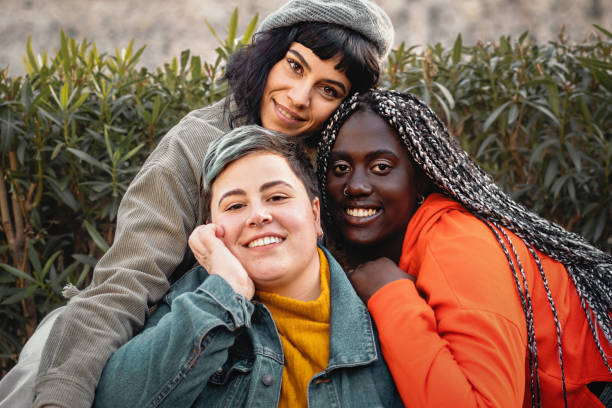 Close-knit Friends Sharing a Warm Embrace - multiethnic diverse women embracing