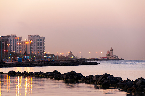 An image of Jeddah, showcasing the city's unique blend of modern and traditional architecture. This major urban centre in Saudi Arabia is a vibrant mix of culture, commerce, and history, set against the backdrop of the Red Sea, reflecting its role as a gateway to the Islamic world.