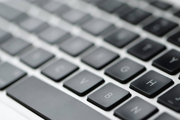 istock Keyboard on laptop computer with cyber protection concept 1929671014