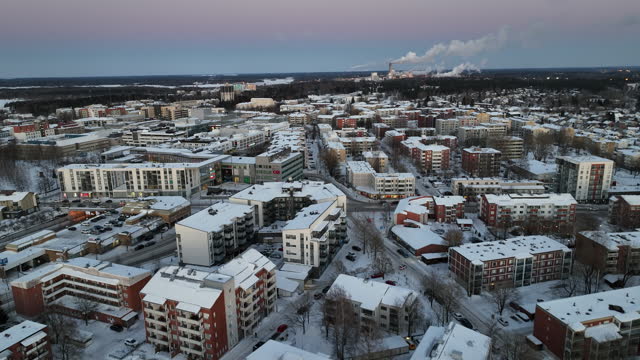 Winter Sunset Over Snow-Covered Town