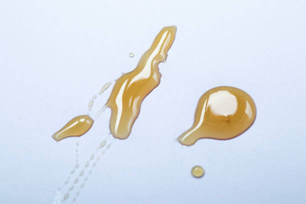 istock Flowing honey isolated on white background. Ideal for packaging. 1929683803