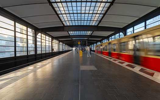 Germany, Berlin, January 08, 2024 - Blurred motion of S-Bahn train arriving subway station, Berlin Charlottenburg
