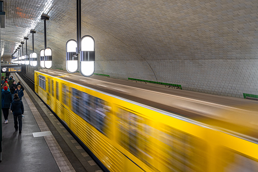 Germany, Berlin, January 09, 2024 - Blurred motion of arriving subway train at subway station, Berlin central